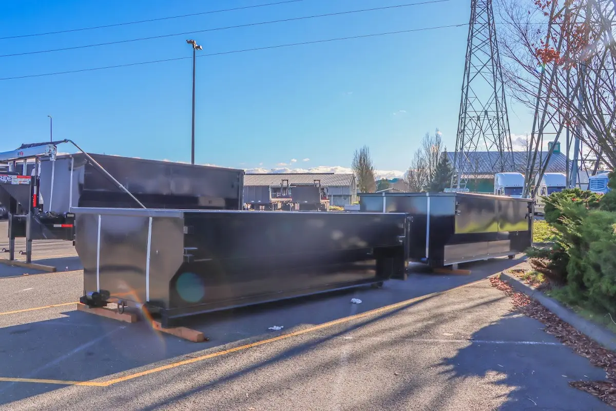 Roll-off dumpster ready for waste disposal at job site for Construction Dumpster Rental in New Philadelphia